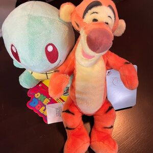 Tigger and squirtle plush toys